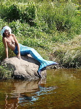 Mermaid on boulder